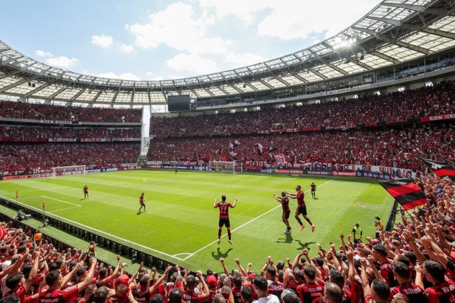 Torcedores do Flamengo em êxtase no Maracanã, com bandeiras e camisas rubro-negras vibrando intensamente.